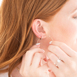video of earrings being put on