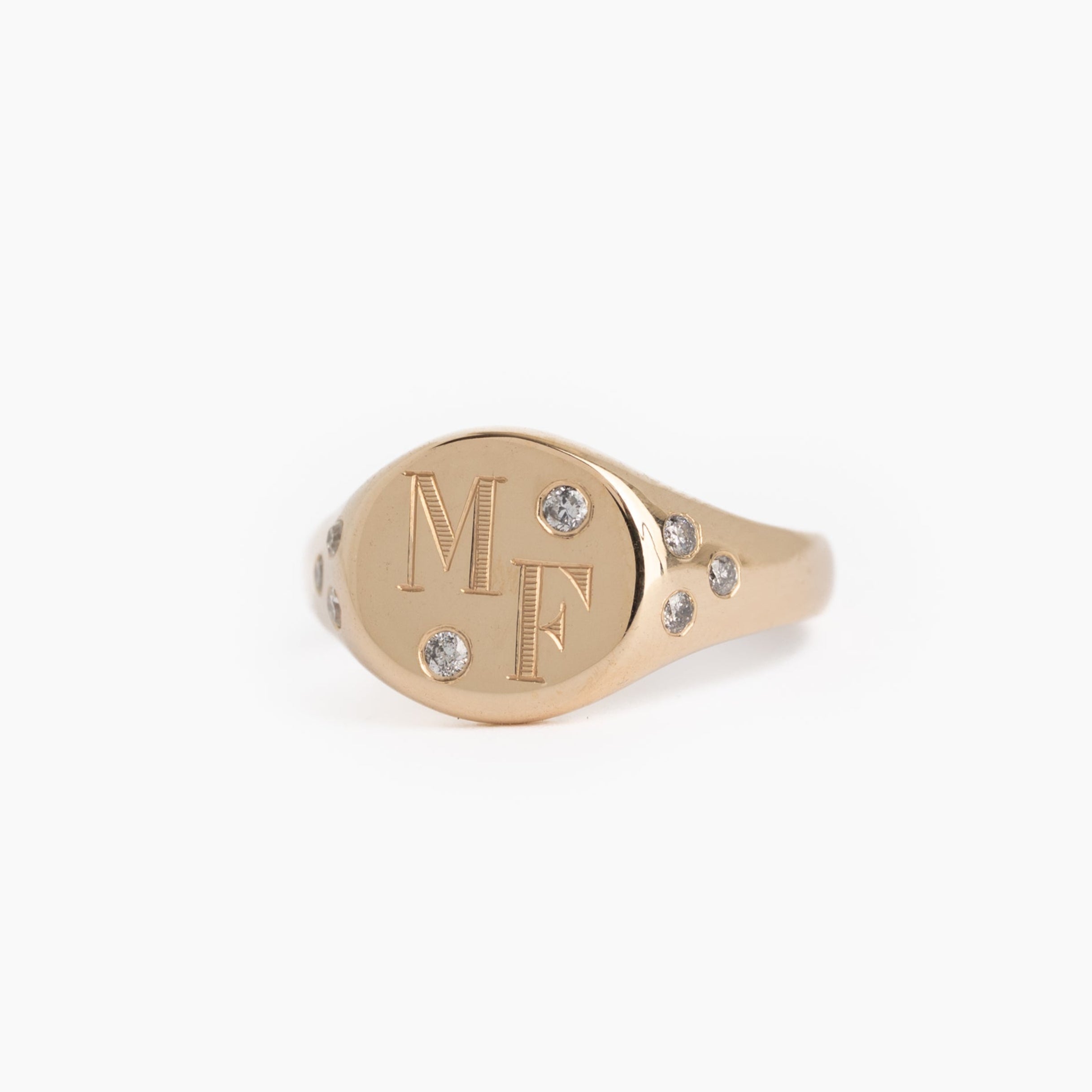 Gold ring with a diamonds on a white background